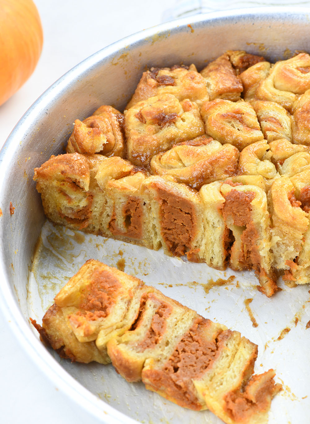 Pumpkin Crescent Roll-Up Bake in a pan.